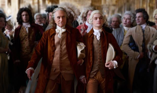 From left: Michael Douglas and Noah Jupe as Benjamin Franklin and his grandson Temple in "Franklin." (Rémy Grandroques/Apple TV+)