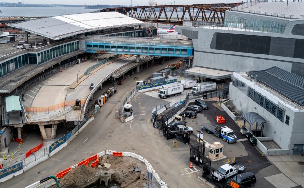 The last section of the old and often vilified Central Terminal Building, left, at LaGuardia Airport in New York, is shown two-thirds demolished on March 24, 2021. Craig Ruttle/AP)