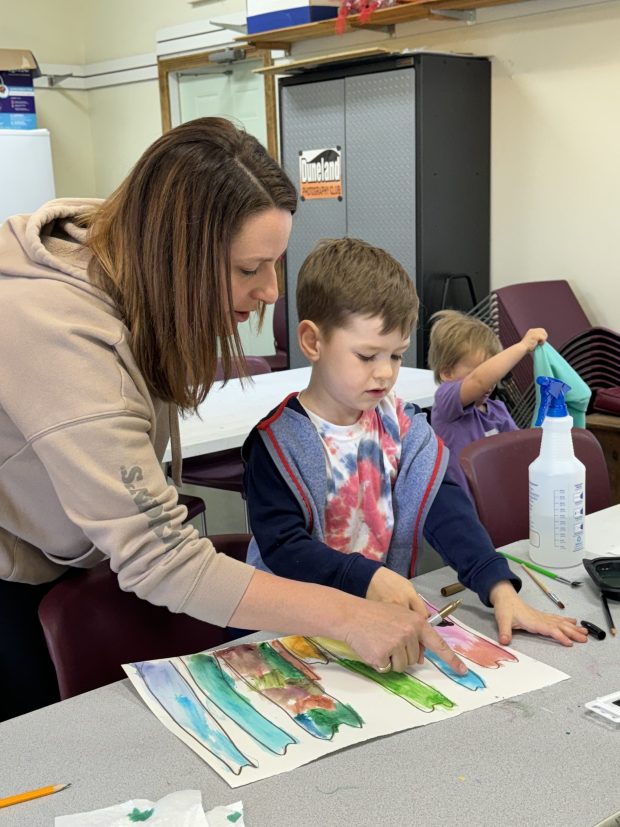 Jackie Strainis and her son, Maverick, of Valparaiso, work on their drawing at the Big & Little class sponsored by the Porter County Parks Department on Wednesday, April 17, 2024. (Deena Lawley-Dixon/for Post-Tribune)