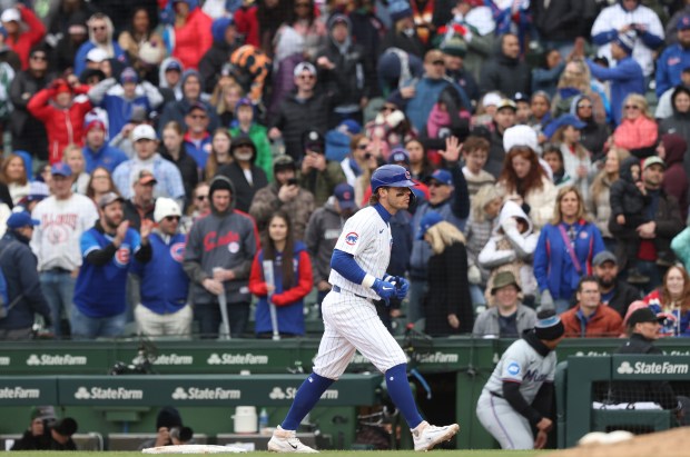 Cubs second baseman Nico Hoerner heads to the dugout after grounding out for a 3-2 loss to the Marlins at Wrigley Field on April 20, 2024, in Chicago. (John J. Kim/Chicago Tribune)