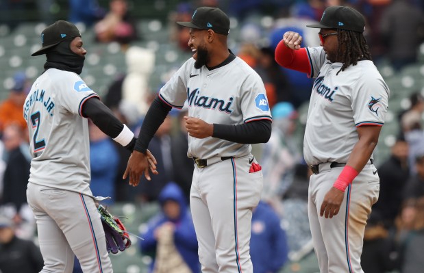 Marlins players celebrate a 3-2 win over the Cubs on April 20, 2024, at Wrigley Field. (John J. Kim/Chicago Tribune)