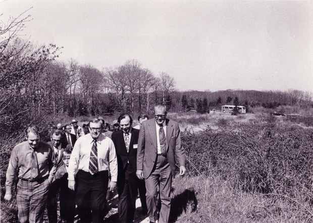A group of officials including Illinois Gov. Richard Ogilvie tours property in 1971 that would become Thorn Creek Woods Nature Preserve. (Friends of Thorn Creek Woods)