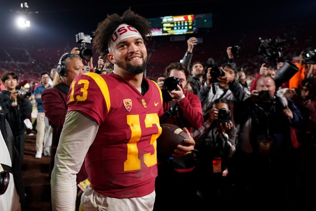 Quarterback Caleb Williams smiles after USC defeated Notre Dame 38-27 on Nov. 26, 2022, in Los Angeles. (Mark J. Terrill/AP)