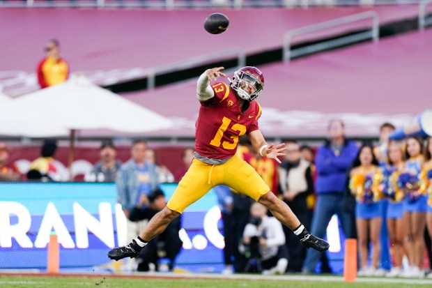 USC quarterback Caleb Williams throws a pass during the second half of the team's NCAA college football game against UCLA, Nov. 18, 2023, in Los Angeles. The Chicago Bears passed up C.J. Stroud and Bryce Young last year because they had Justin Fields. Now, they've got a shot at Caleb Williams.(AP Photo/Ryan Sun, File)