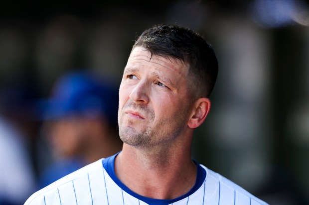 Chicago Cubs pitcher Drew Smyly (11) stands in the dugout during the sixth inning against the Miami Marlins at Wrigley Field on April 21, 2024. (Eileen T. Meslar/Chicago Tribune)