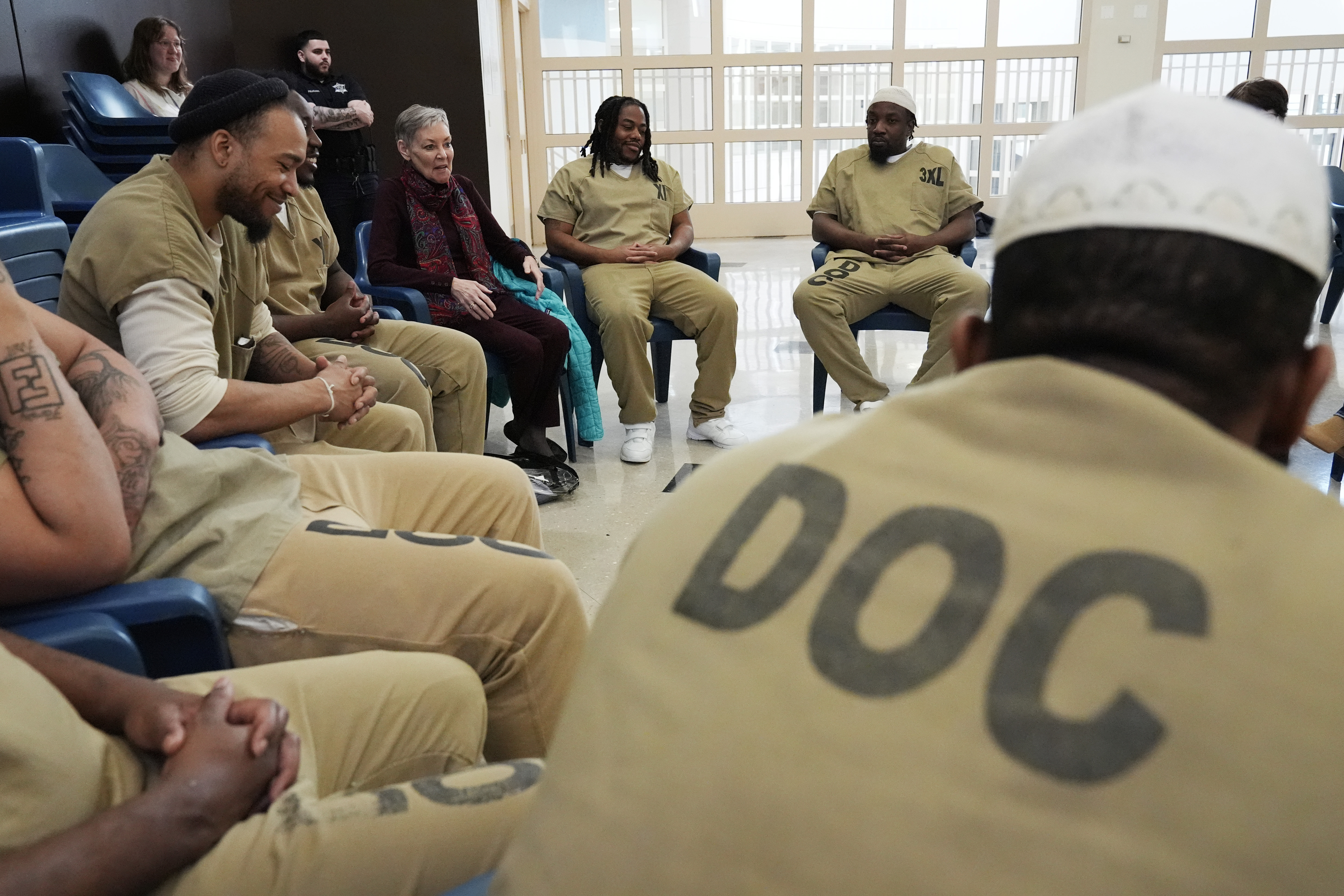 Detainees, DePaul students, DePaul staff, Helen Damon-Moore, third from right,...