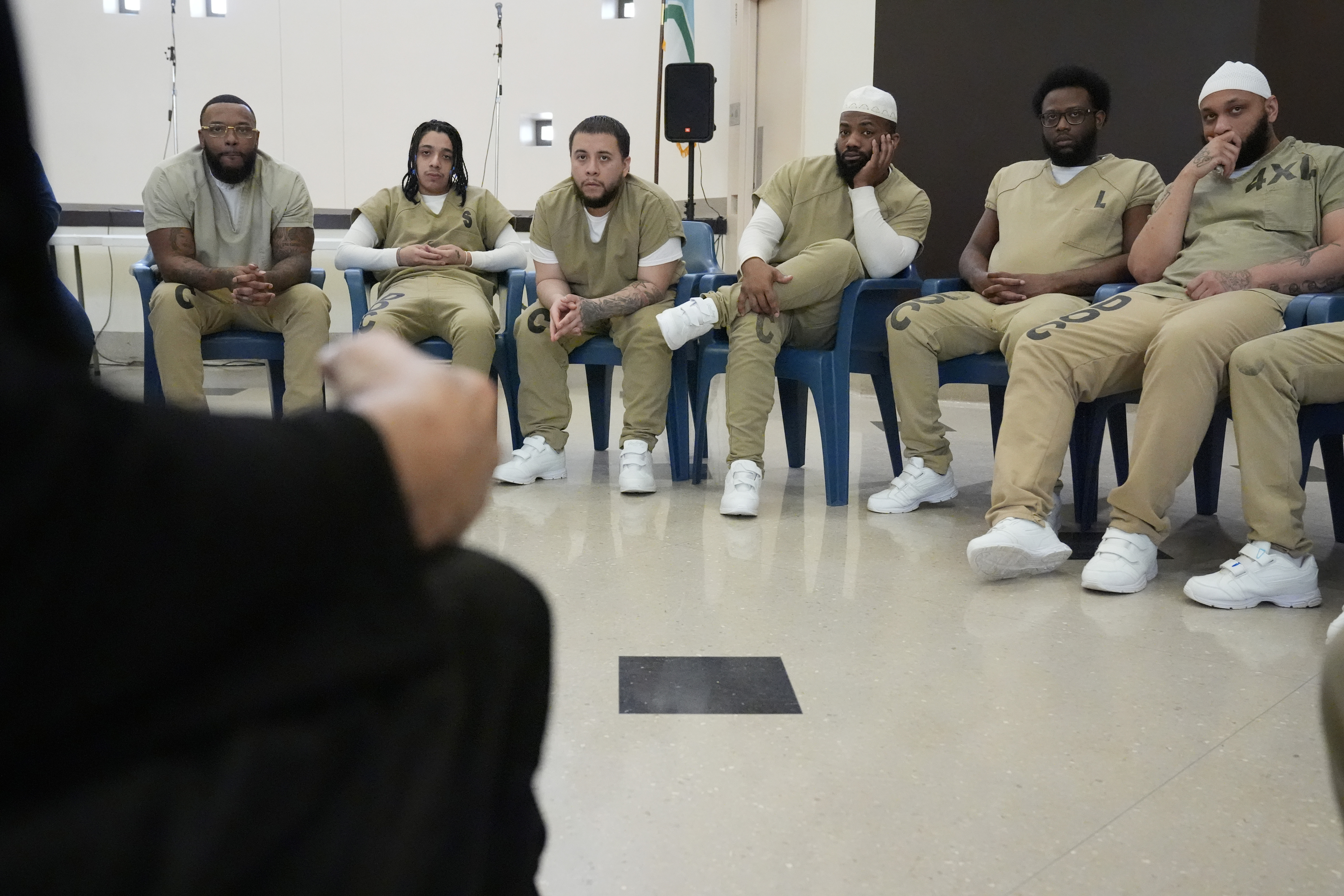 Detainees attend a book club at Department Of Corrections Division...
