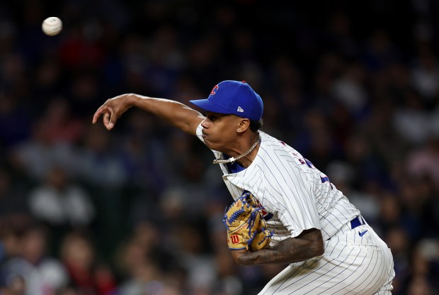 Chicago Cubs relief pitcher Yency Almonte (25) delivers to the Houston Astros in the 8th inning of a game at Wrigley Field in Chicago on April 23, 2024. (Chris Sweda/Chicago Tribune)