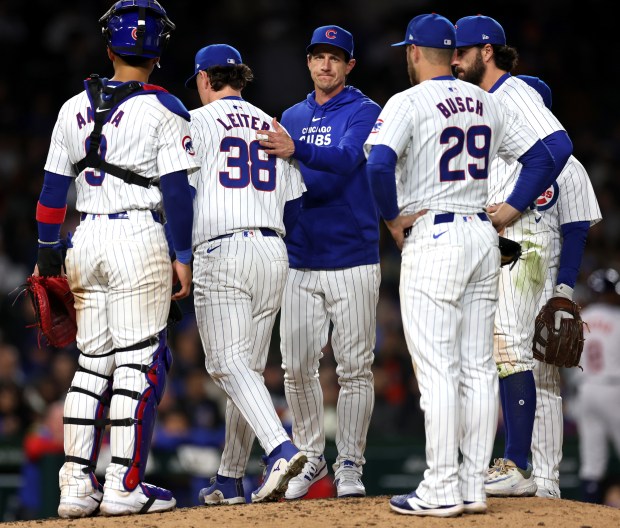 Chicago Cubs manager Craig Counsell pulls relief pitcher Mark Leiter Jr. (38) from the game in the 8th inning against the Houston Astros at Wrigley Field in Chicago on April 23, 2024. (Chris Sweda/Chicago Tribune)