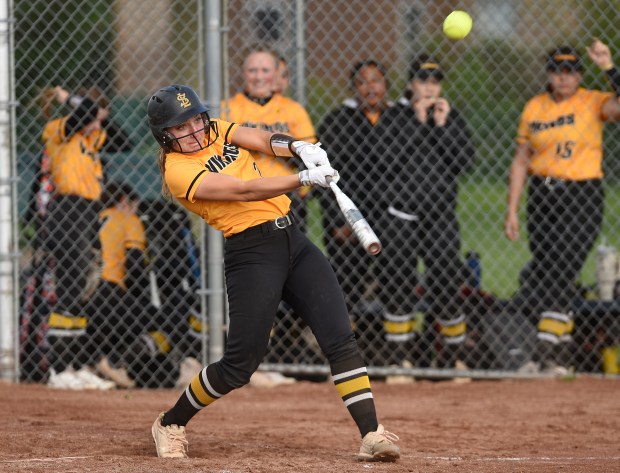 St. Laurence's Jordan Ogean (2) puts the ball in play against Providence during a Girls Catholic Athletic Conference game Tuesday, April 23, 2024 in Burbank, IL. (Steve Johnston/Daily Southtown)