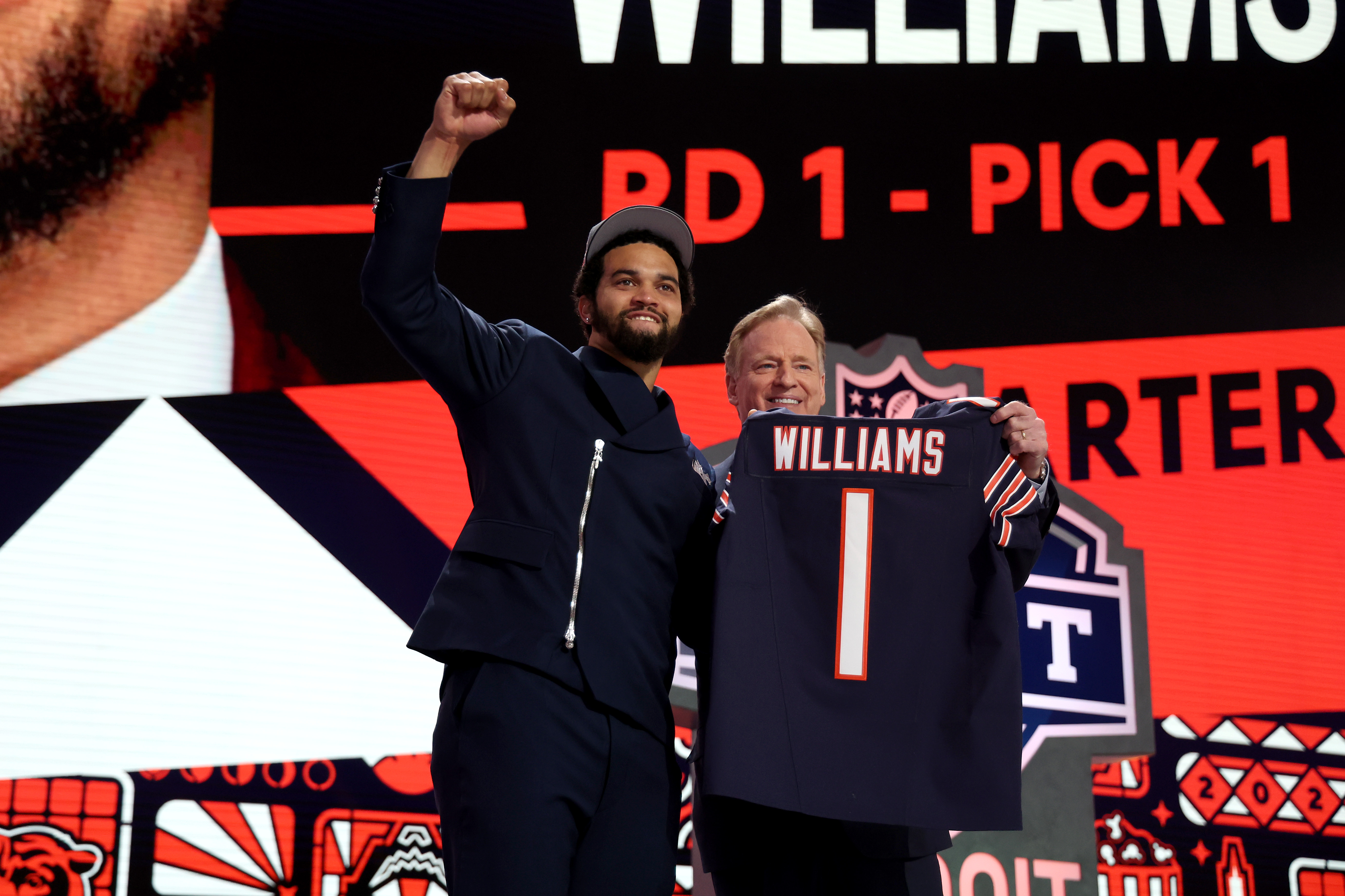 Caleb Williams poses with NFL Commissioner Roger Goodell after the...