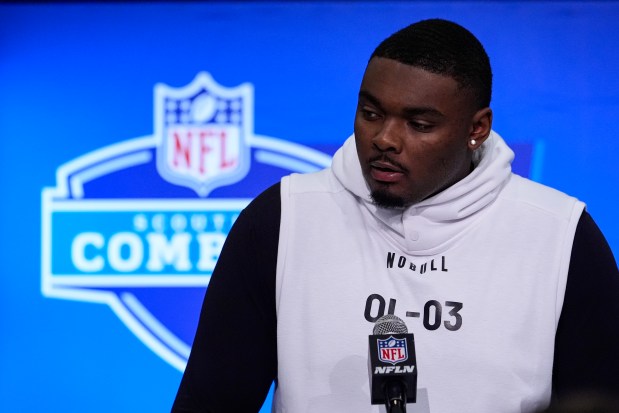 Yale offensive lineman Kiran Amegadjie speaks at the NFL combine on March 2, 2024, in Indianapolis. (AP Photo/Michael Conroy)
