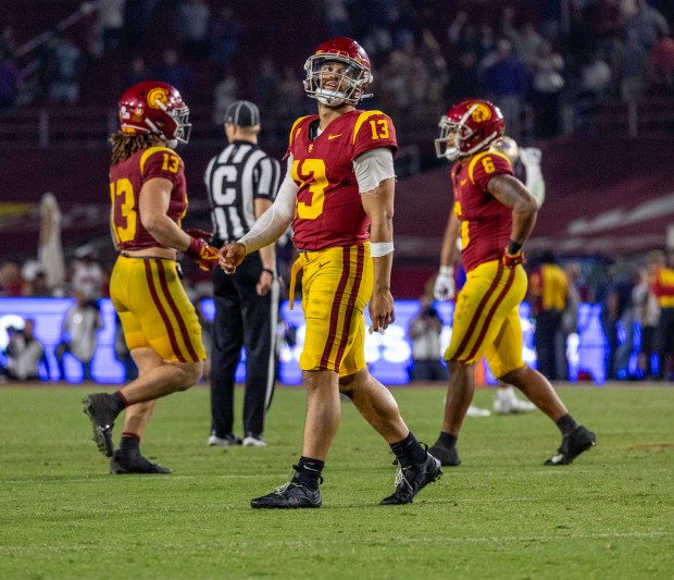 USC quarterback Caleb Williams walks off the field after the final offensive play of the game in the Trojans' 52-42 loss to Washington on Nov. 4, 2023 in Los Angeles. (Gina Ferazzi/Los Angeles Times)