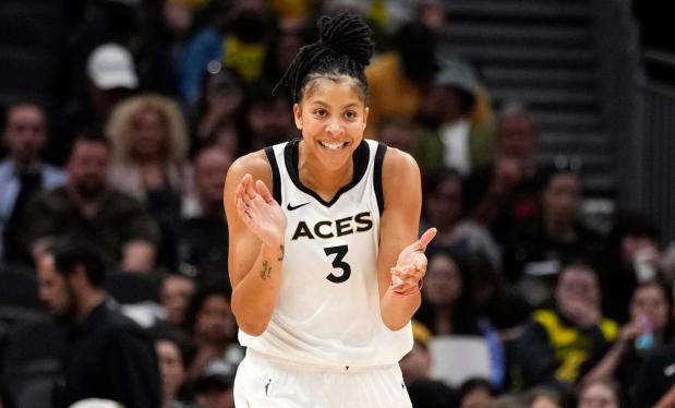 FILE - Las Vegas Aces forward Candace Parker reacts during the first half of a WNBA basketball game against the Seattle Storm, May 20, 2023, in Seattle. The three-time WNBA champion has announced she's retiring. Parker, a two-time league MVP, announced in a social media post on Sunday, April 28, 2024 that she's ending her career after 16 seasons. (AP Photo/Lindsey Wasson, File)