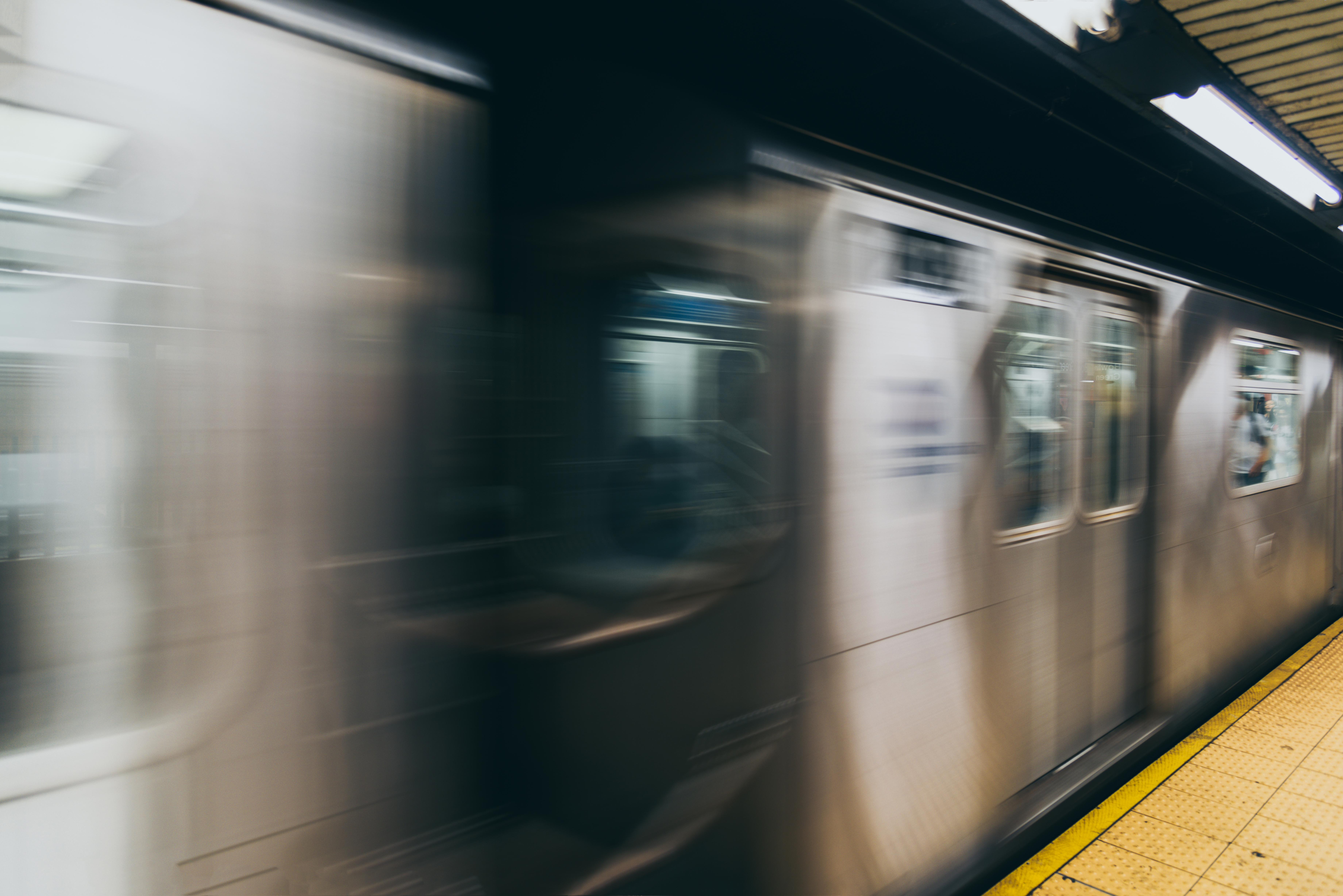 A New York City subway car pulls into the station.