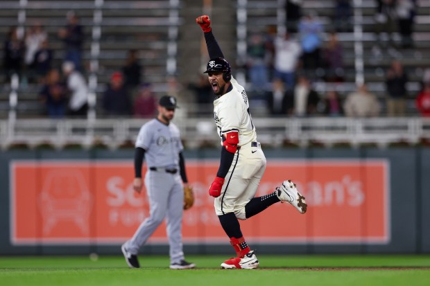 Minnesota Twins Byron Buxton celebrates while running the bases on a home run against the Chicago White Sox during the ninth inning of a baseball game Tuesday, April 23, 2024, in Minneapolis. (AP Photo/Stacy Bengs)