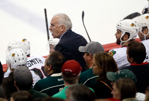 Blackhawks coach Joel Quenneville watches the action in the 3rd period of a game against the Wild on May 6, 2014 (Scott Strazzante/Chicago Tribune)