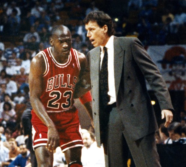 Then-Bulls coach Doug Collins talks with Michael Jordan during a game on May 1, 1989. (Chicago Tribune)