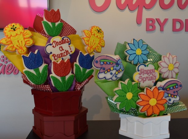 Cookie bouquets start at $55.99 at Cookies By Design in Naperville. A dozen cupcakes sold at Cupcakes By Design, located in the same store, start at $39. (Steve Metsch/Naperville Sun)