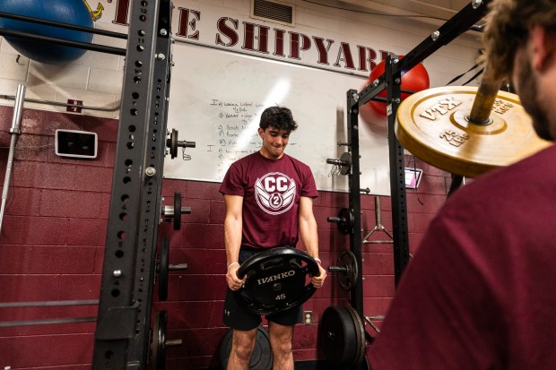 Dylan Nagle and his teammates ended up doing team workouts in the gym after weather forced a cancellation of their game in Lockport on Thursday, April 4, 2024. (Vincent D. Johnson/for the Daily Southtown)