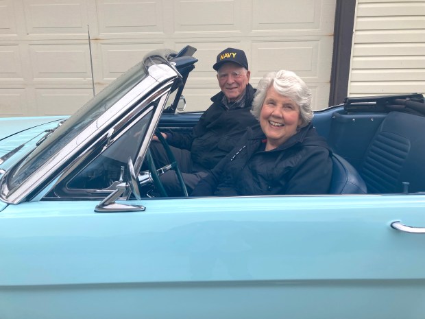 Gail Wise bought the first Ford Mustang ever sold in the United States on April 15, 1964, before she married her husband Tom Wise. The Park Ridge couple is celebrating 60 years of ownership of the historic "pony car." (Pam DeFiglio, Chicago Tribune/Pioneer Press)