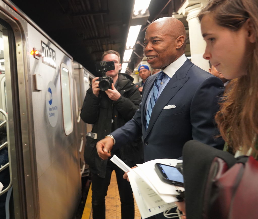 New York City Mayor Eric Adams rides the subway on Jan. 27, 2023.