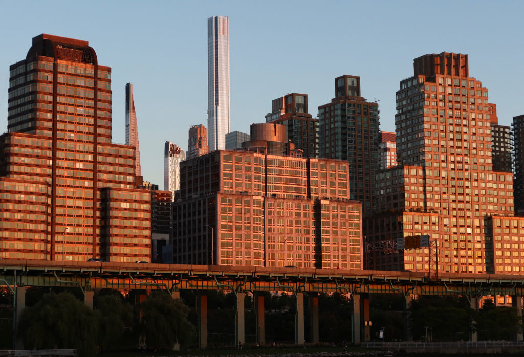 The sun sets over the West Side Highway in Manhattan on Sept. 19, 2023.