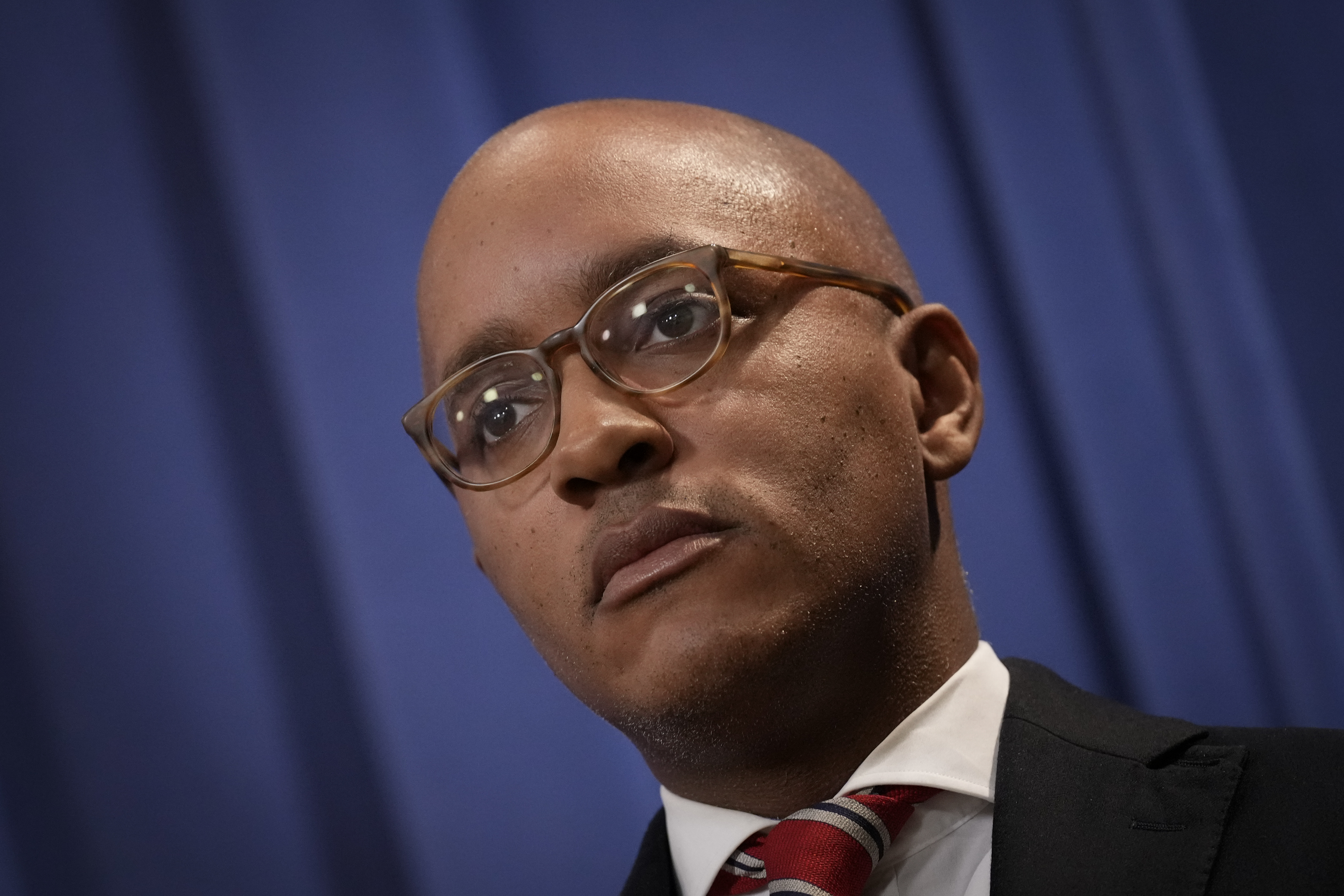 U.S. Attorney Damian Williams for the Southern District of New York attends a news conference.