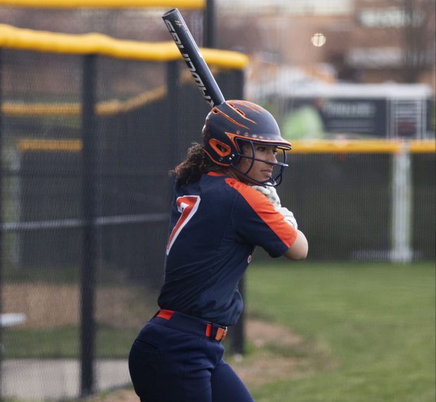 Naperville North's Olivia Hebron (7) practices her swings before batting against Lincoln-Way Central during a game in Naperville on Friday, April 12, 2024. (Nate Swanson/for the Naperville Sun)