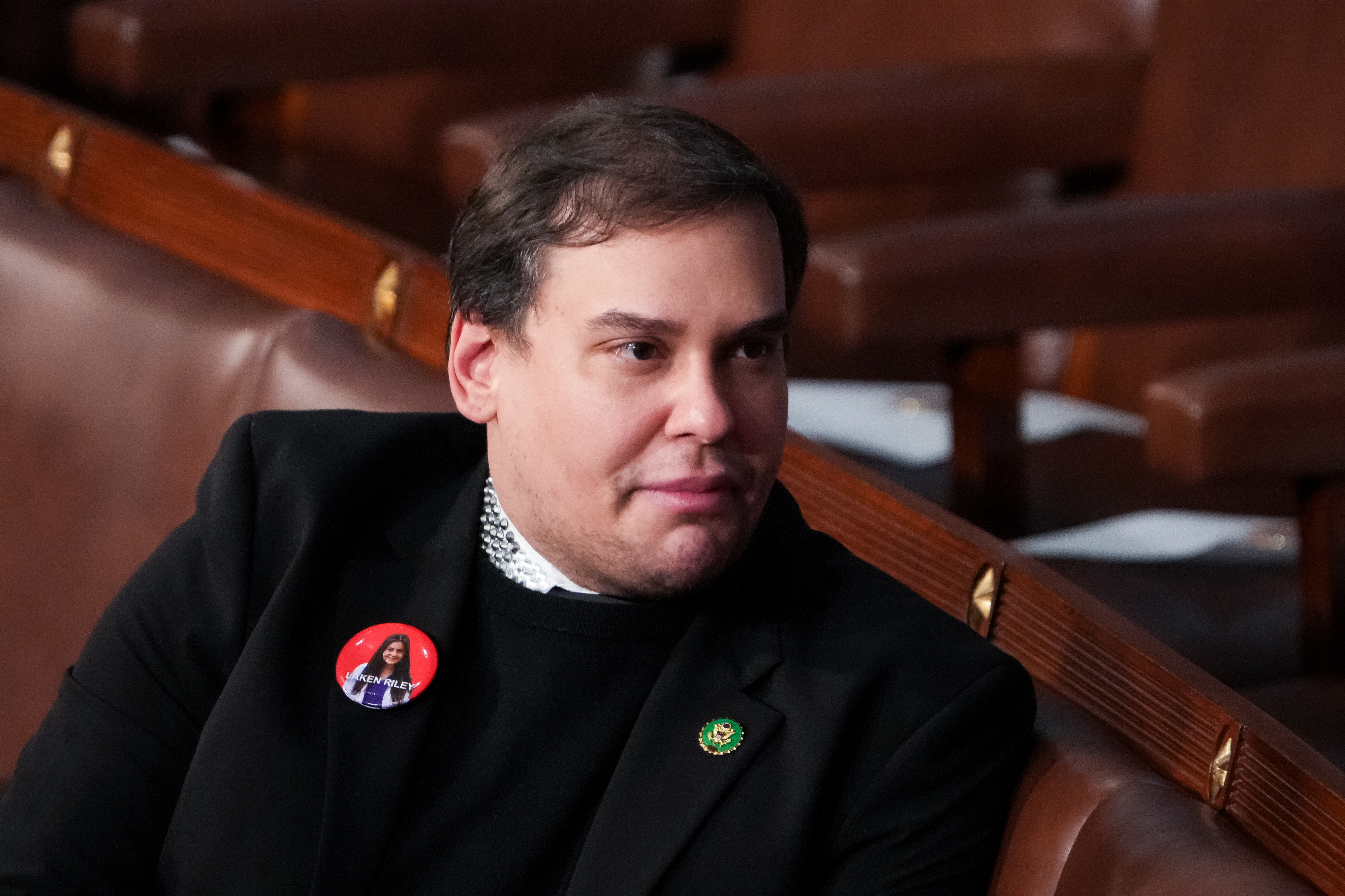 Former Rep. George Santos, R-N.Y., sits on the House floor before the start of President Joe Biden's State of the Union Address to the joint session of Congress in the U.S. Capitol on Thursday, March 7, 2024.