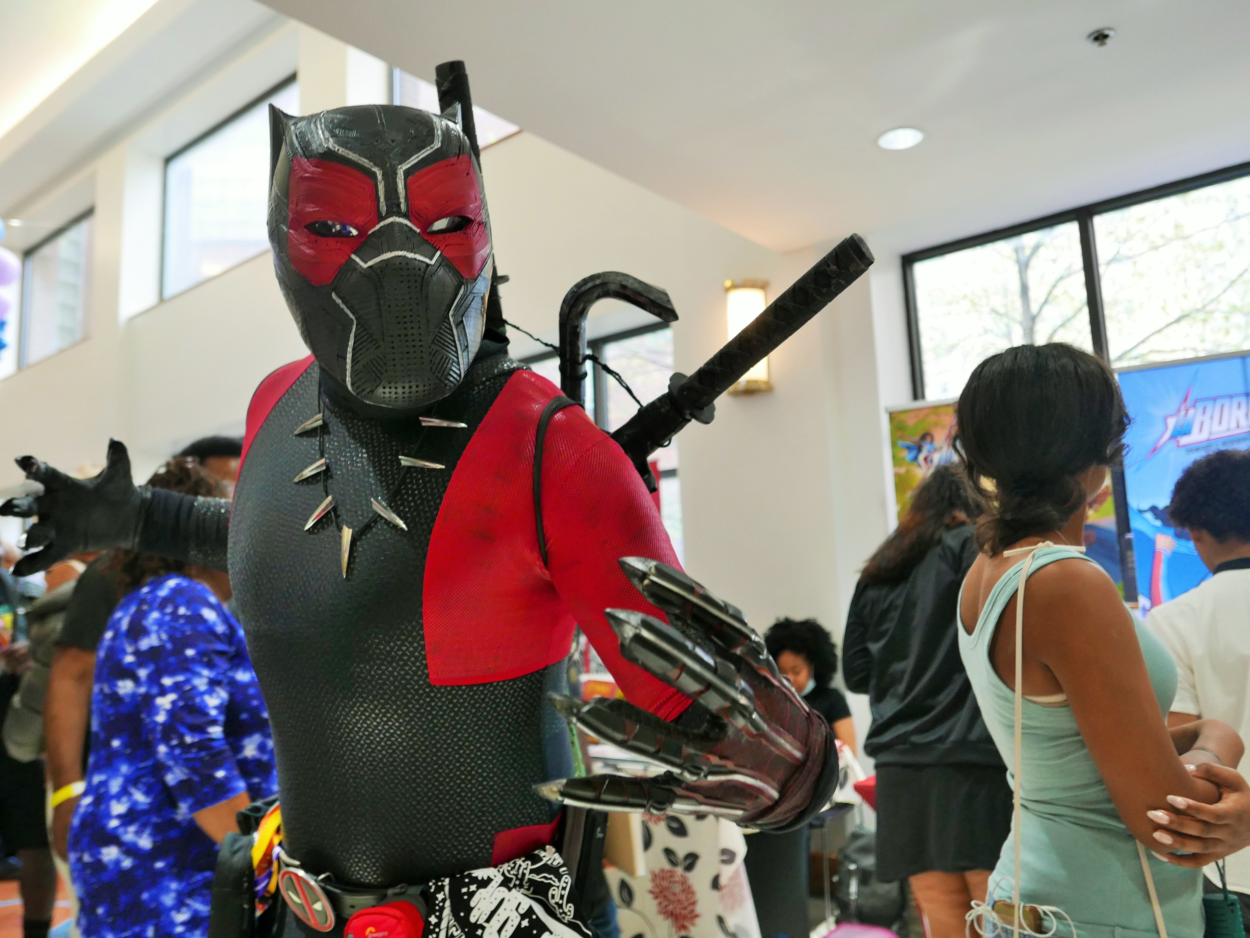 a person dressed in red and black