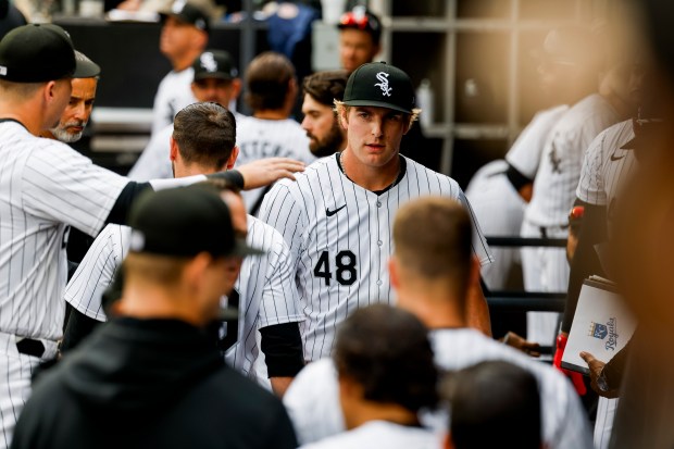 White Sox starter Jonathan Cannon (48) receives high-fives from teammates during a game against the Royals on April 17, 2024, at Guaranteed Rate Field. (Vincent Alban/Chicago Tribune)