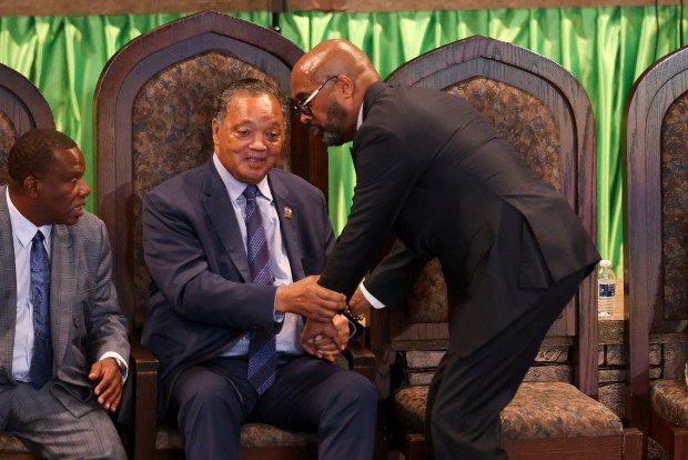 Rev. Jesse L. Jackson, Sr. speaks with Rev. Frederick Douglass Haynes III during the Rainbow/PUSH Coalition Annual Convention at the Apostolic Church of God in the Woodlawn neighborhood on July 16, 2023. (Eileen T. Meslar/Chicago Tribune)