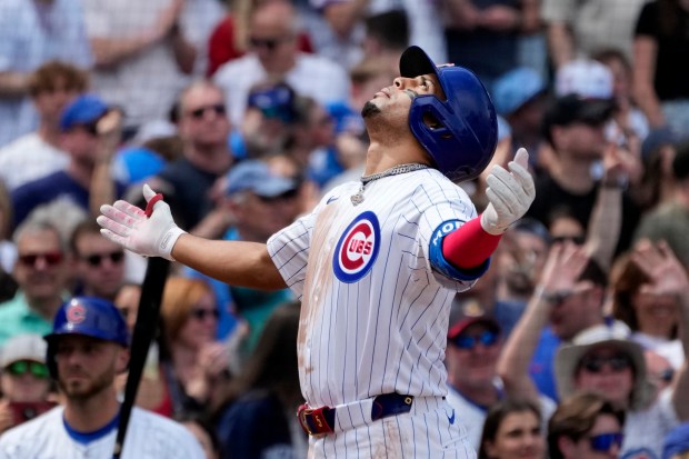 The Cubs' Christopher Morel celebrates his two-run home run off Brewers pitcher Tobias Myers during the third inning Saturday, May 4, 2024, at Wrigley Field. (AP Photo/Charles Rex Arbogast)