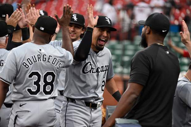 White Sox center fielder Rafael Ortega, center, celebrates with teammates after defeating the Cardinals on Saturday, May 4, 2024, in St. Louis. (AP Photo/Jeff Le)