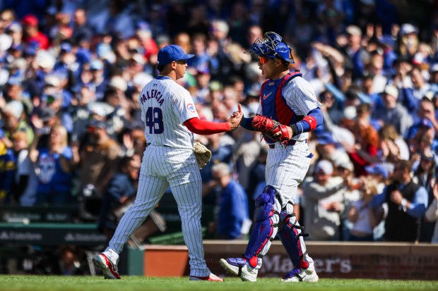 Chicago Cubs pitcher Daniel Palencia (48) and catcher Miguel Amaya (9) celebrate after Palencia got a strikeout to win the game against the Milwaukee Brewers at Wrigley Field on May 5, 2024. (Eileen T. Meslar/Chicago Tribune)