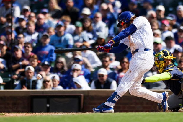 Chicago Cubs outfielder Patrick Wisdom (16) singles during the eighth inning against the Milwaukee Brewers at Wrigley Field on May 5, 2024. (Eileen T. Meslar/Chicago Tribune)