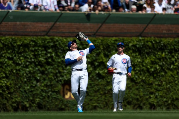 Chicago Cubs outfielder Ian Happ (8) catches a fly ball during the second inning against the Milwaukee Brewers at Wrigley Field on May 5, 2024. (Eileen T. Meslar/Chicago Tribune)