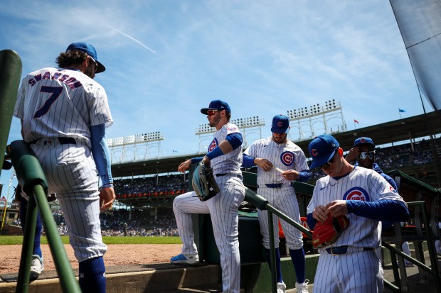 Chicago Cubs players prepare before the game against the Milwaukee Brewers at Wrigley Field on May 5, 2024. (Eileen T. Meslar/Chicago Tribune)