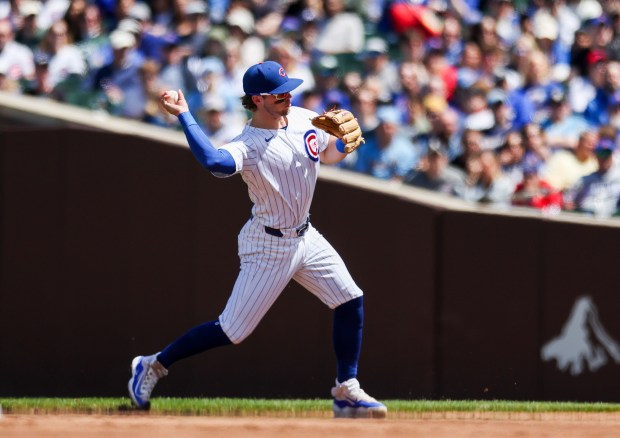 Chicago Cubs second base Nico Hoerner (2) throws to first base after fielding a ground ball during the second inning against the Milwaukee Brewers at Wrigley Field on May 5, 2024. (Eileen T. Meslar/Chicago Tribune)