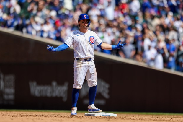 Chicago Cubs second baseman Nico Hoerner (2) celebrates after batting in two runs on a double during the fifth inning against the Milwaukee Brewers at Wrigley Field on May 5, 2024. (Eileen T. Meslar/Chicago Tribune)