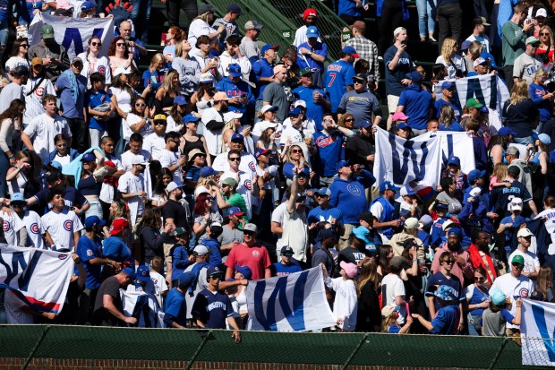 Chicago Cubs fans celebrate after the Chicago Cubs beat the Milwaukee Brewers at Wrigley Field on May 5, 2024. (Eileen T. Meslar/Chicago Tribune)