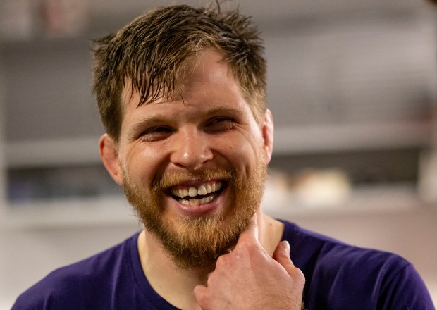 Joe Rau smiles while working out with the Northwestern wrestling team on campus on April 30, 2024, in Evanston. Rau recently qualified to compete for the U.S. Olympic Team in Paris Games after coming close in 2016 and 2021. (Brian Cassella/Chicago Tribune)