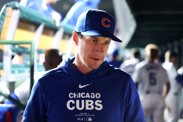 Chicago Cubs manager Craig Counsell (30) walks through the dugout after pulling starting pitcher Shota Imanaga from the game in the 8th inning against the San Diego Padres at Wrigley Field in Chicago on May 7, 2024. (Chris Sweda/Chicago Tribune)