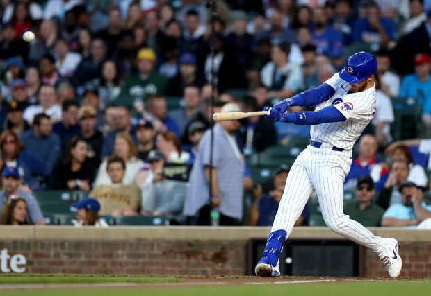 Chicago Cubs designated hitter Cody Bellinger hits a solo home run in the fourth inning of a game against the San Diego Padres at Wrigley Field in Chicago on May 7, 2024. (Chris Sweda/Chicago Tribune)
