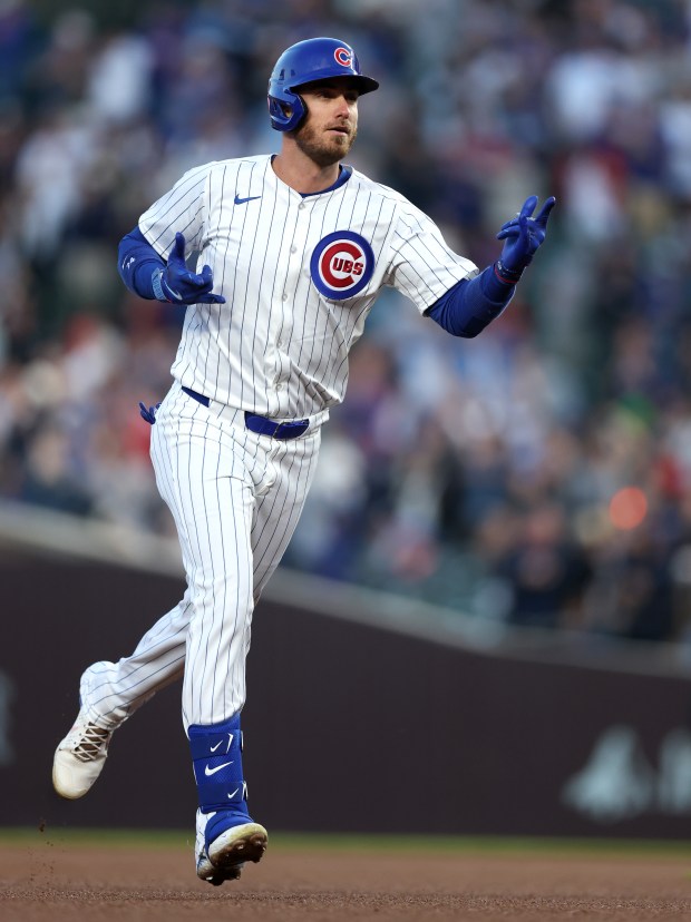 Chicago Cubs designated hitter Cody Bellinger celebrates as he rounds the bases after hitting a solo home run in the fourth inning of a game against the San Diego Padres at Wrigley Field in Chicago on May 7, 2024. (Chris Sweda/Chicago Tribune)