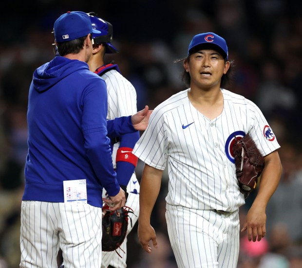 Chicago Cubs manager Craig Counsell (30) pulls starting pitcher Shota Imanaga from the game in the 8th inning against the San Diego Padres at Wrigley Field in Chicago on May 7, 2024. (Chris Sweda/Chicago Tribune)