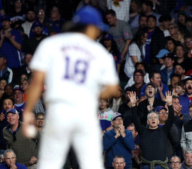 With Chicago Cubs starting pitcher Shota Imanaga (18) on the mound, fans react with one out to go in the 7th inning of a game against the San Diego Padres at Wrigley Field in Chicago on May 7, 2024. (Chris Sweda/Chicago Tribune)