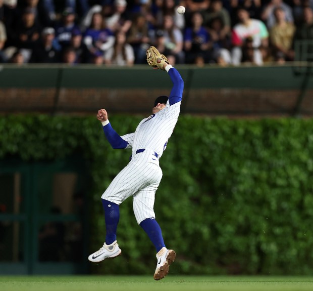 Chicago Cubs second baseman Nico Hoerner (2) makes a leaping catch of a ball that went for the final out of the 8th inning against the San Diego Padres at Wrigley Field in Chicago on May 7, 2024. (Chris Sweda/Chicago Tribune)