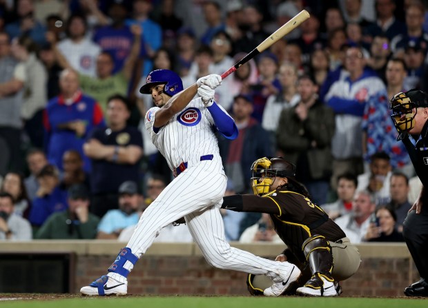 Chicago Cubs third baseman Christopher Morel drives in a run on a sacrifice fly in the 8th inning of a game against the San Diego Padres at Wrigley Field in Chicago on May 7, 2024. (Chris Sweda/Chicago Tribune)